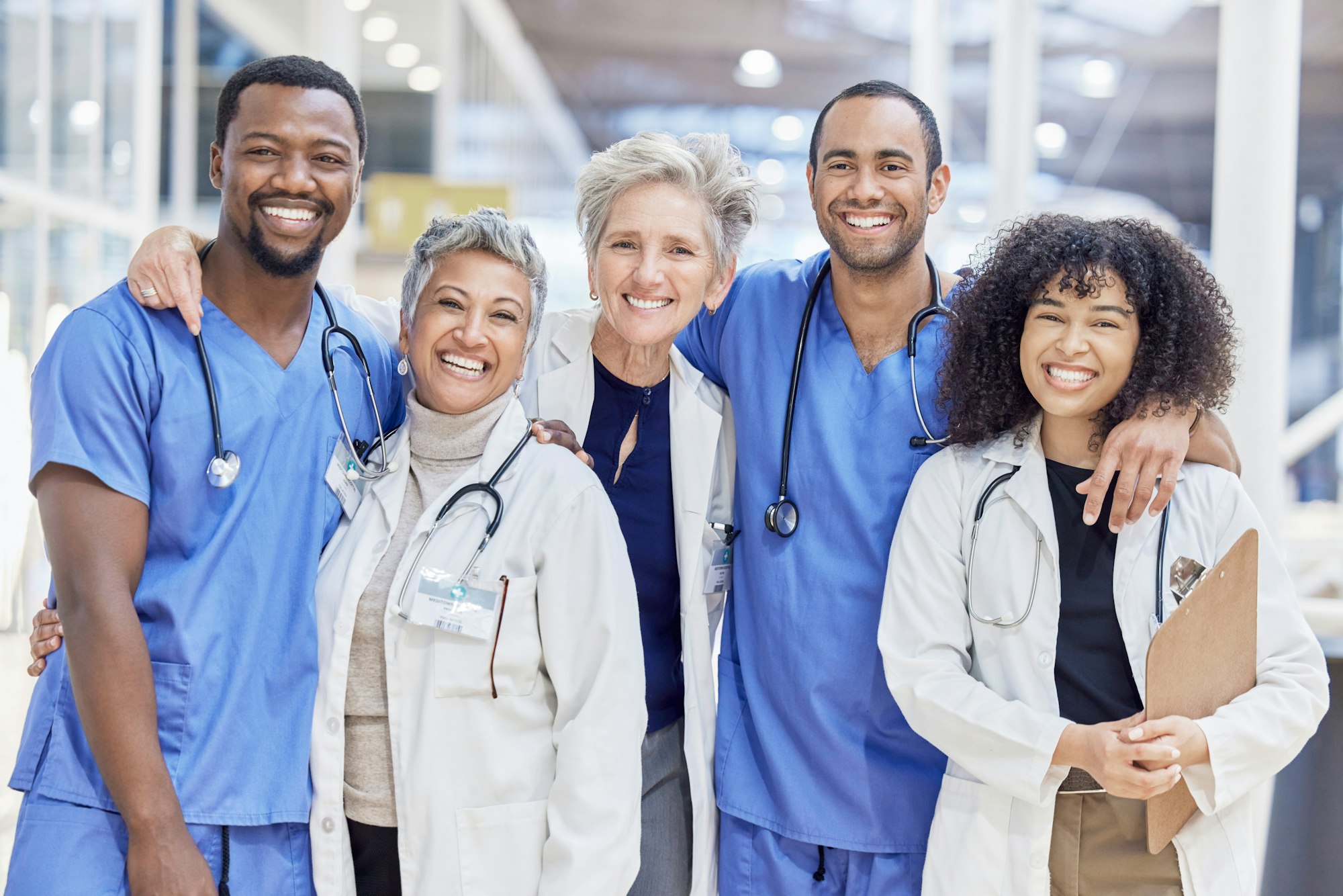 Happy portrait, group and doctors for healthcare service, leadership and teamwork in hospital diver